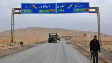 A picture taken on March 2, 2017, shows a sign displaying the routes to Palmyra-Deir Ezzor and Damascus-Iraq. (AFP)