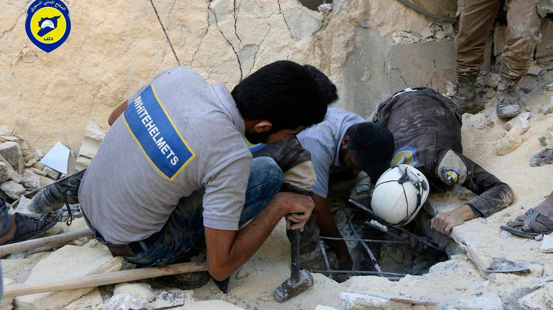 White Helmets workers search underground in Aleppo, Syria. (File photo: AP)
