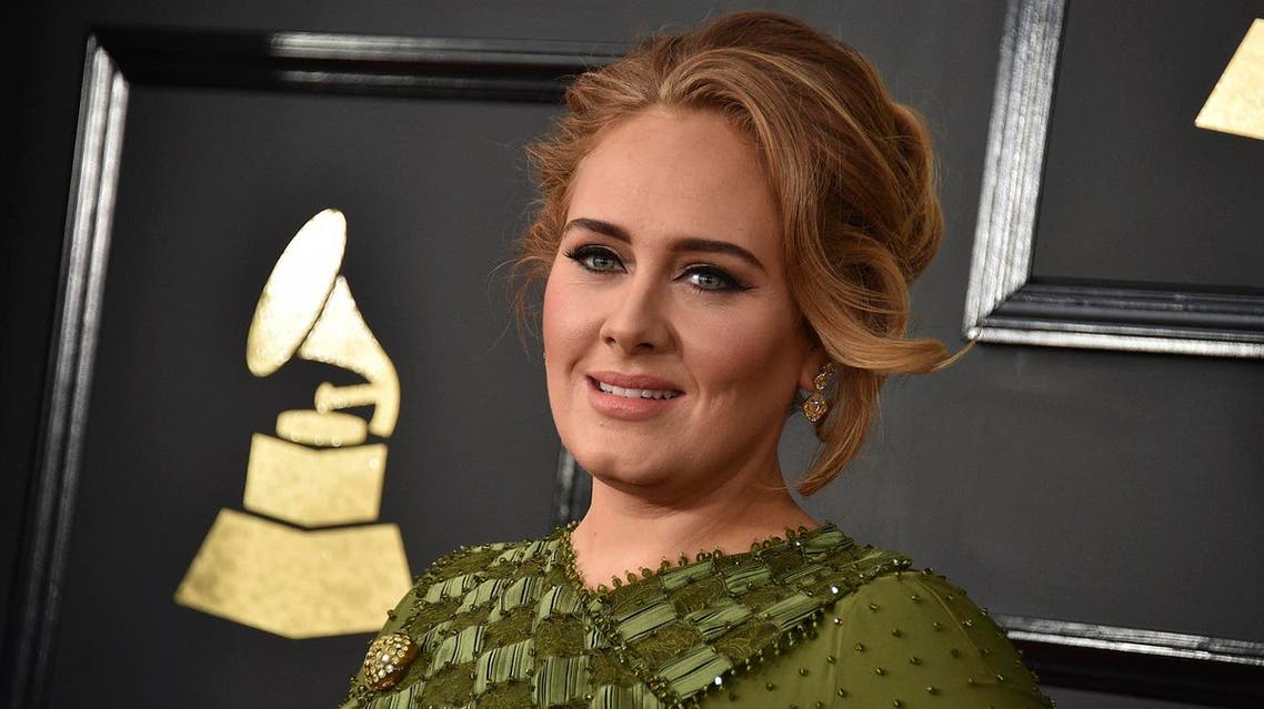 In this Feb. 12, 2017, file photo, Adele arrives at the 59th annual Grammy Awards at the Staples Center in Los Angeles. Adele confirmed her marriage to partner Simon Konecki in remarks to the audience at her concert in Brisbane, Australia, on Saturday, March 4, 2017. (AP)