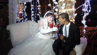 PHOTOS: Egyptian couple celebrate wedding 18 years after marriage
