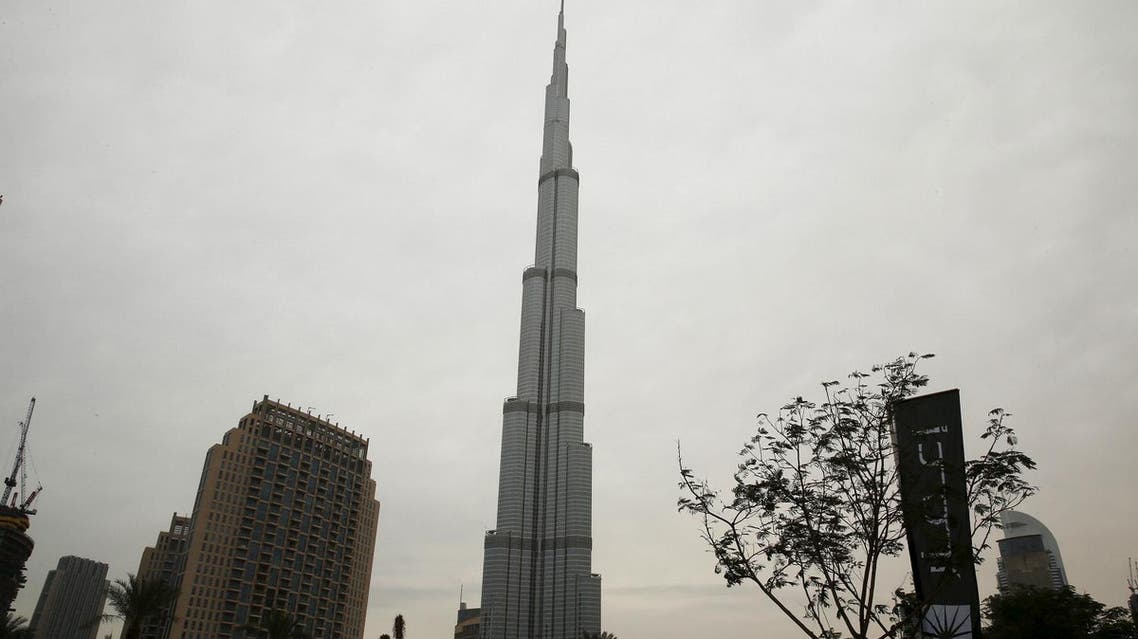 A flag for property company EMAAR is seen near the Burj Khalifa, the tallest building in the world (File Photo: Reuters/Ahmed Jadallah)
