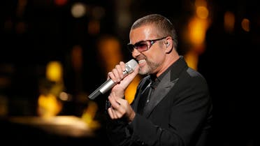 British singer George Michael performs at a concert to raise money for AIDS charity Sidaction, during the Symphonica tour at Palais Garnier Opera house in Paris, France, Sunday, Sept. 9, 2012. (AP)