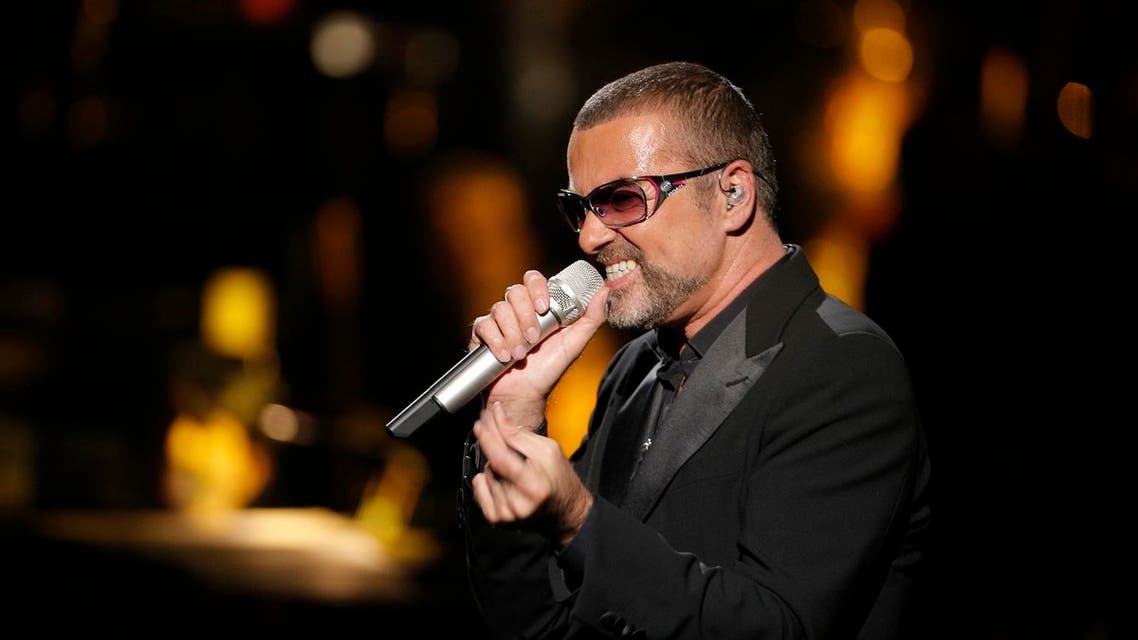 British singer George Michael performs at a concert to raise money for AIDS charity Sidaction, during the Symphonica tour at Palais Garnier Opera house in Paris, France, Sunday, Sept. 9, 2012. (AP)