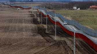 Hungary approves putting migrants in camps at border
