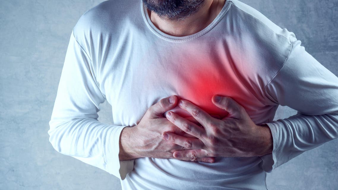 Severe heartache, man suffering from chest pain, having painful