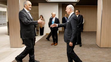 Bashar al-Jaafari (L), Syrian chief negotiator shakes hands with Staffan de Mistura in Geneva, Switzerland, on March 3, 2017. (Reuters)