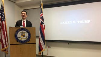 Hawaii becomes first US state to sue over Trump’s new travel ban