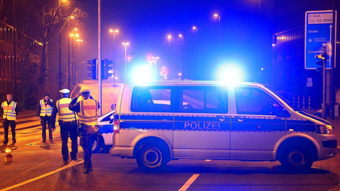 Policemen block a road near the site where a unexploded World War II bomb was found in Duesseldorf, western Germany, on March 8, 2017. (AFP)