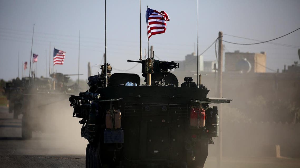 A convoy of US forces armoured vehicles drives near the village of Yalanli, on the western outskirts of the northern Syrian city of Manbij, on March 5, 2017. (AFP)