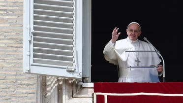 Pope Francis waves to the crowd from the window of the apostolic palace during the Sunday Angelus prayer, on March 5, 2017 at St Peter's square in Vatican. (AFP)