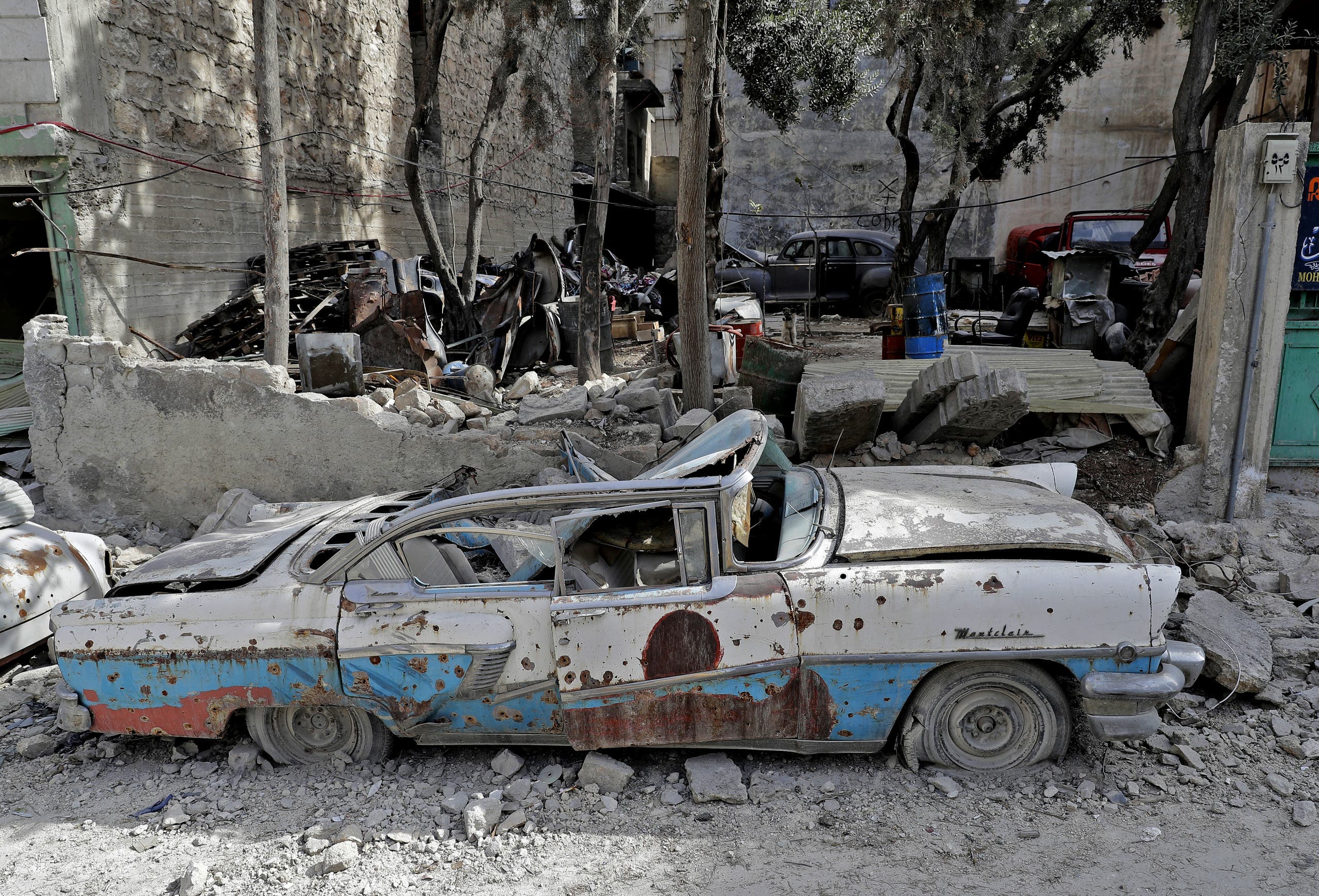 A picture taken on March 9, 2017, shows a 1957 Mercury Montclair parked outside the home of Mohammad Mohiedine Anis in Aleppo's formerly rebel-held al-Shaar neighbourhood. AFP
