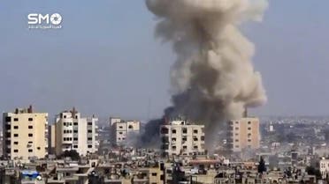 A still image taken from a video uploaded to a social media website, on February 25, 2017, purports to show air strikes in the rebel-held al-Waer area of Homs, Syria