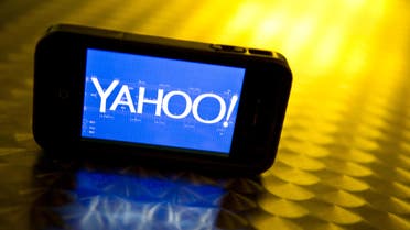 This file photo illustration taken on September 12, 2013 shows the Yahoo logo seen on a smartphone. AFP