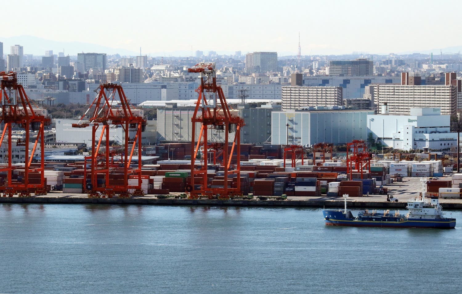 A ship sails before an international cargo terminal in Tokyo. (AFP)