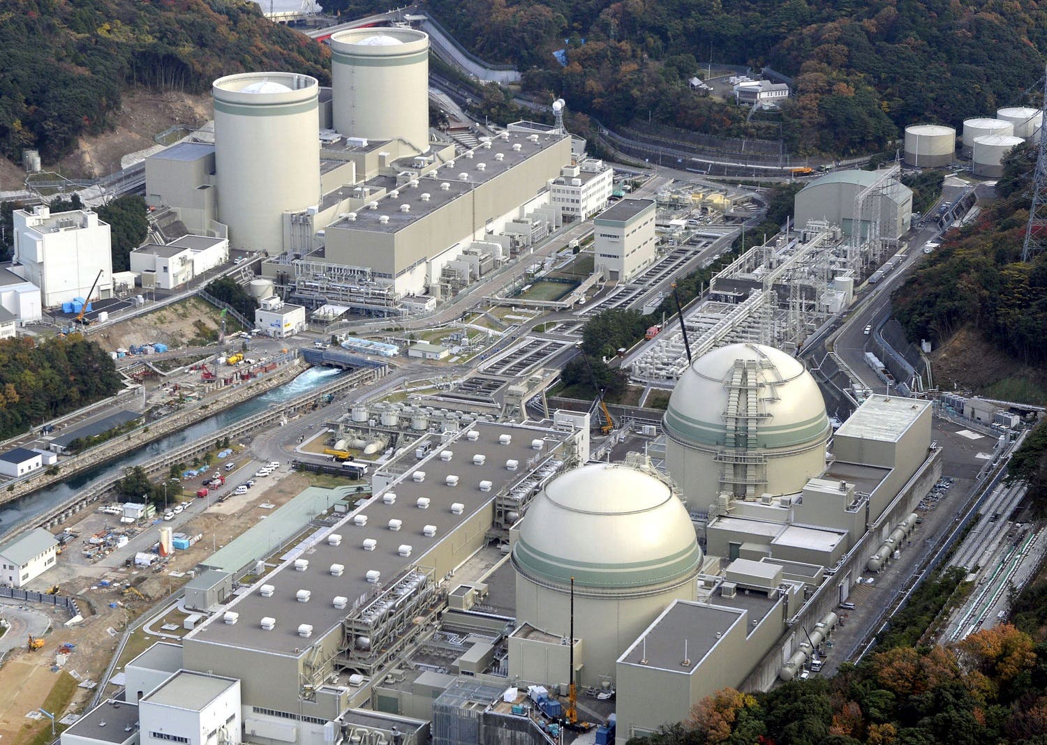 An aerial view shows No. 4 (front L), No. 3 (front R), No. 2 (rear L) and No. 1 reactor buildings at Kansai Electric Power Co.'s Takahama nuclear power plant in Takahama town, Fukui prefecture. (Reuters)