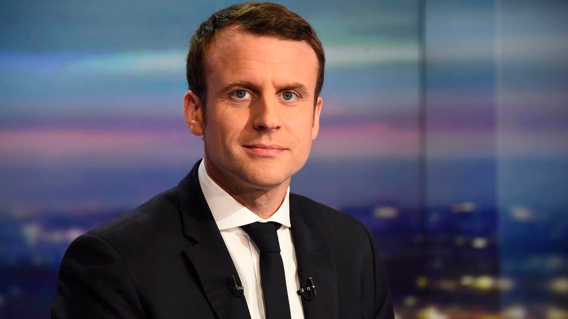 Emmanuel Macron is pictured prior to taking part in the live evening news at the studios of French private television channel TF1 on March 12, 2017 in Boulogne-Billancourt. (AFP)