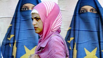 EU court says employers may bar staff from wearing headscarves