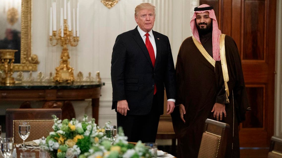 President Donald Trump with Saudi Defense Minister and Deputy Crown Prince Mohammed bin Salman before lunch in the State Dining Room of the White House in Washington, Tuesday, March 14, 2017. (AP)