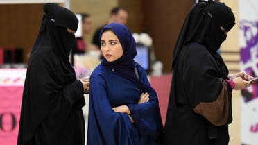 Saudi women queue outside the "convention hall" at Princess Noura bint Abdulrahman University in the Saudi capital Riyadh on October 6, 2016. (AFP)