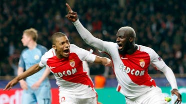 Monaco's Tiemoue Bakayoko, right, celebrates his side side's 3rd goal with Kylian Mbappe during a Champions League round of 16 second leg soccer match between Monaco and Manchester City at the Louis II stadium in Monaco, Wednesday March 15, 2017. (AP)