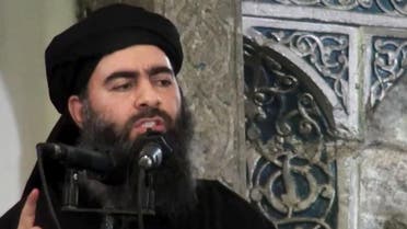 This file image made from video posted on a militant website Saturday, July 5, 2014, purports to show the leader of the Islamic State group, Abu Bakr al-Baghdadi, delivering a sermon at a mosque in Iraq during his first public appearance. (AP)