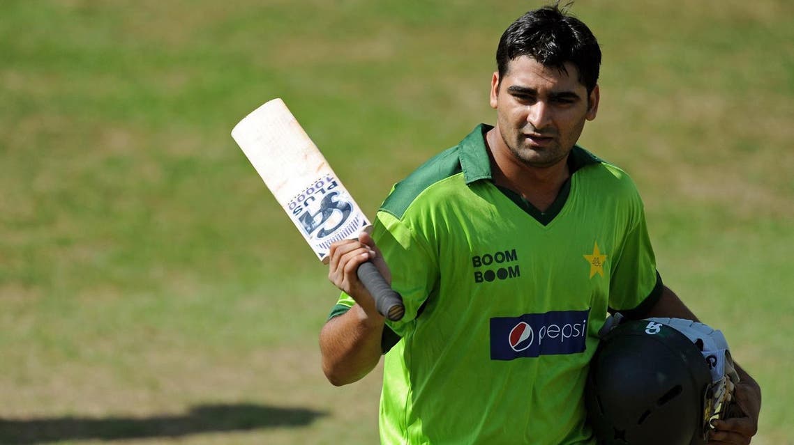 Pakistan's Shahzaib Hasan leaves the field after being dismissed for 105 runs during their match against English county side Somerset, at the County Ground in Taunton, south-west England, on September 2, 2010. (AFP)