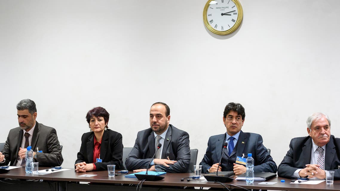 Syria’s main opposition delegation with High Negotiations Committee leader Nasr al-Hariri, center, attend a meeting with United Nations special envoy for Syria Staffan de Mistura during Syria peace talks in Geneva. (AP)