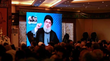 Lebanon’s Hezbollah leader Hassan Nasrallah addresses his supporters through a screen during a rally in Jebshit village, southern Lebanon. (File Photo: Reuters)