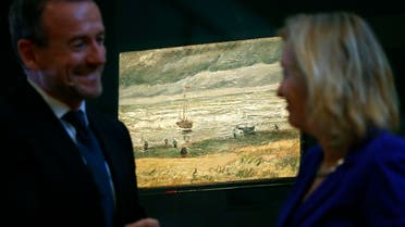 Van Gogh Museum director Axel Rueger, left, and Jet Bussemaker, Minister for Education, Culture and Science, stand next to the stolen and recovered "Seascape at Scheveningen" by Dutch master Vincent van Gogh, during a press conference in Amsterdam, Netherlands, Tuesday, March 21, 2017. (AP)