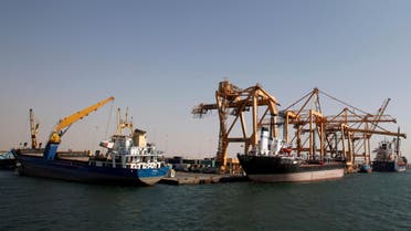 Ships are docked next to giant cranes, damaged by Saudi-led air strikes, at a container terminal at the Red Sea port of Hodeidah, Yemen November 16, 2016