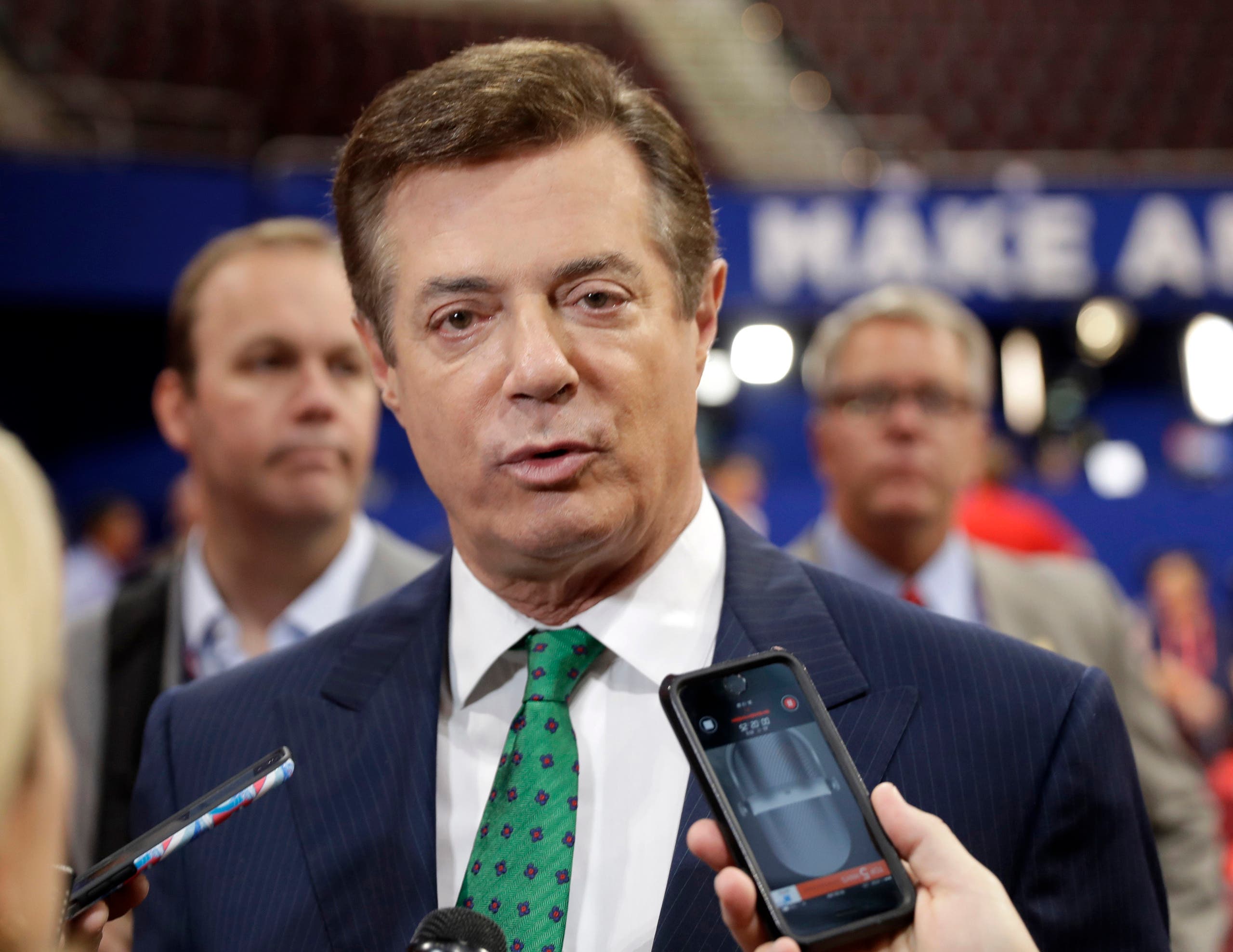In this July 17, 2016 file photo, Trump Campaign Chairman Paul Manafort talks to reporters on the floor of the Republican National Convention at Quicken Loans Arena in Cleveland. (File photo: AP)