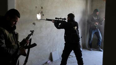 A fighter from the Free Syrian Army's Tahrir al Sham militant group aims his rifle in Damascus. (File Photo: Reuters)