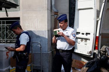 Belgian police officers Ann Vercammen (L) and Tarek Chatt patrol at a market in the Brussels district of Molenbeek, Belgium. (File Photo: Reuters)