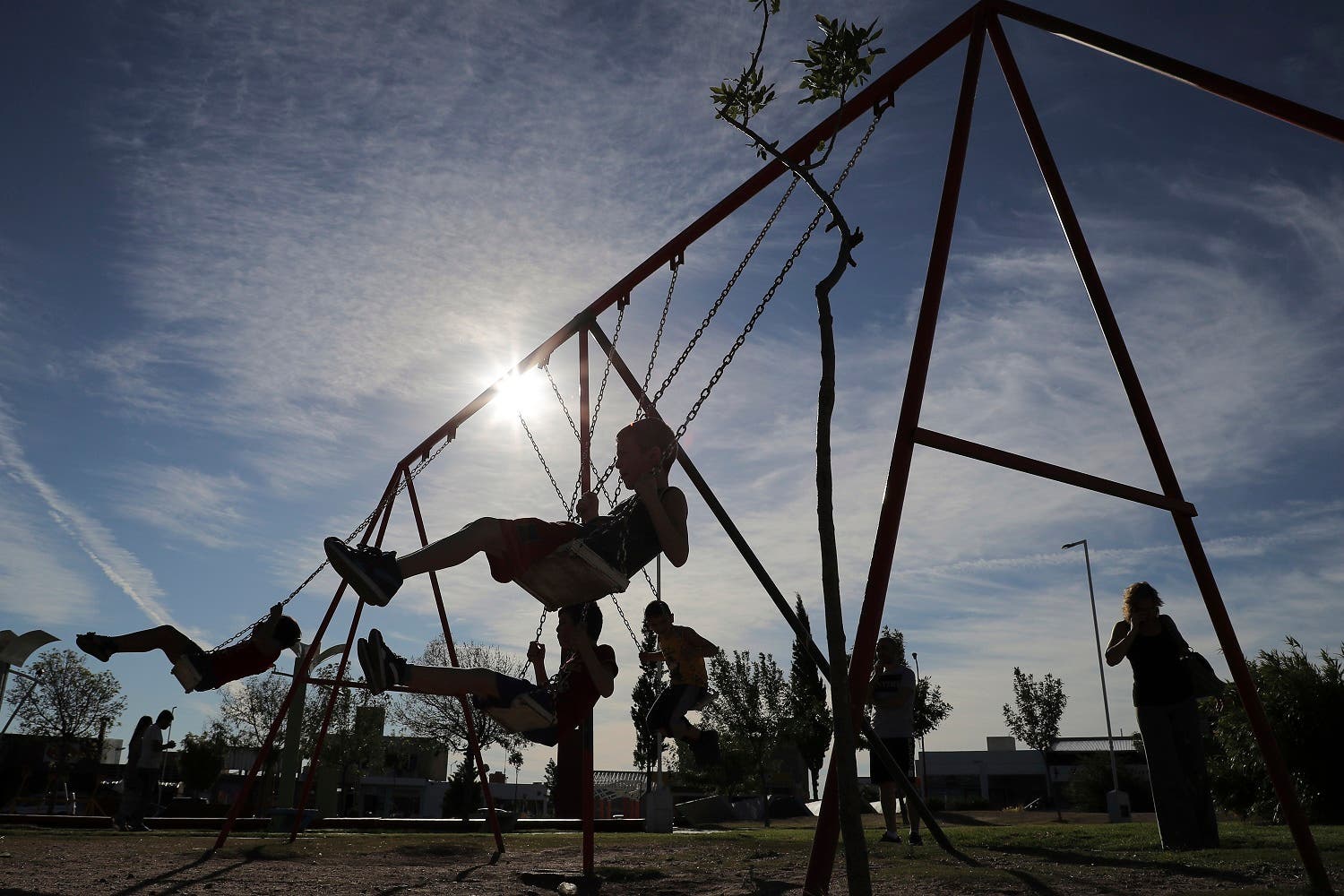 Syrian migrant children play in a park in the town of La Punta, San Luis, Argentina. (AP)