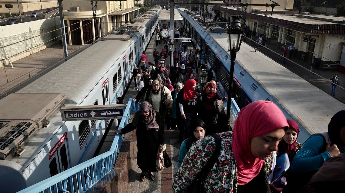 Egyptian women exit a metro station in Cairo. Egypt doubled the price of tickets to 2 Egyptian pounds, effective from Friday. (File photo: Reuters)