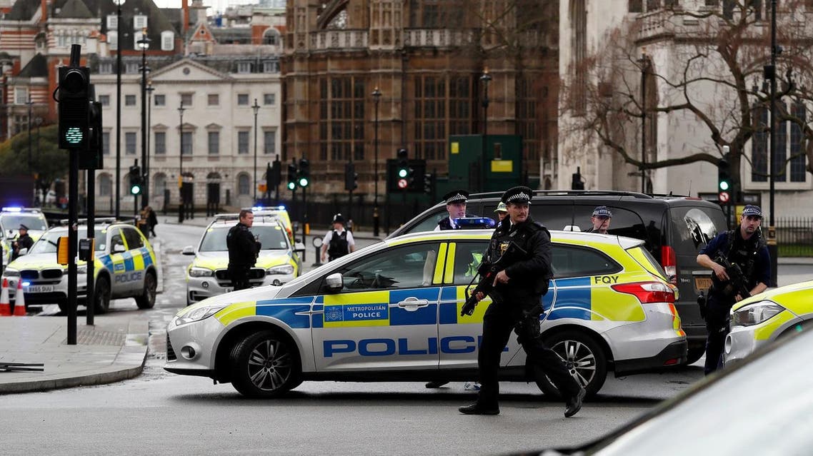 Armed police respond outside Parliament during an incident on Westminster Bridge in London, Britain March 22, 2017. REUTERS/