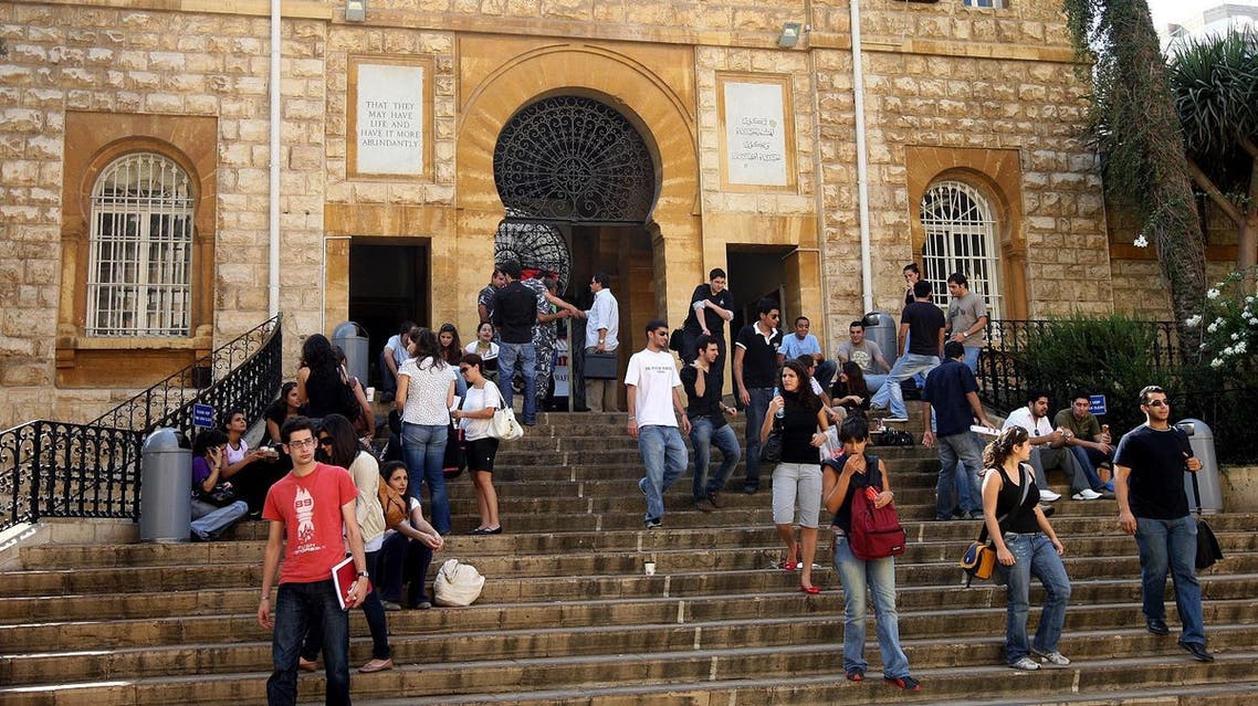 Lebanese students of the American University in Beirut (AUB) gather on the steps of their university campus. (AFP)