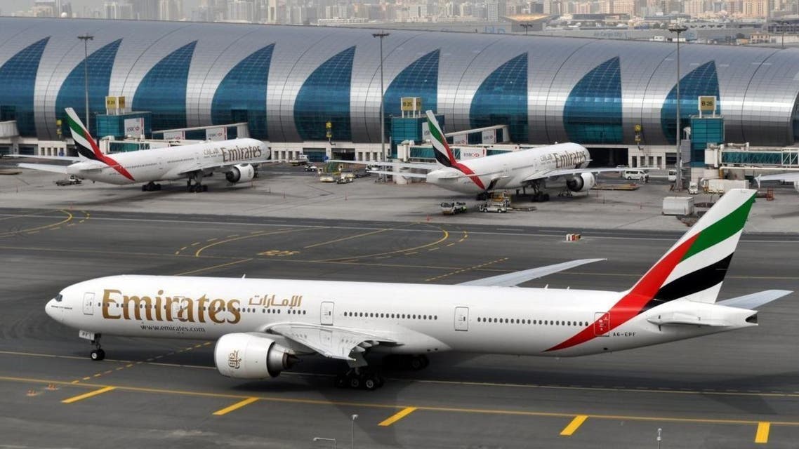 An Emirates plane taxis to a gate at Dubai International Airport at Dubai International Airport in Dubai, United Arab Emirates, on Wednesday, March 22, 2017. The president of the Middle East's biggest airline says a ban on electronics other than mobile phones in the cabins of U.S.-bound flights came as a complete surprise as he defended security measures at its Dubai hub. (AP Photo/Adam Schreck)