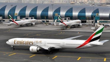 An Emirates plane taxis to a gate at Dubai International Airport at Dubai International Airport in Dubai, United Arab Emirates, on Wednesday, March 22, 2017. The president of the Middle East's biggest airline says a ban on electronics other than mobile phones in the cabins of U.S.-bound flights came as a complete surprise as he defended security measures at its Dubai hub. (AP Photo/Adam Schreck)