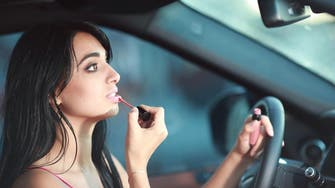 Dubai motorists face fines for applying makeup while driving, allowing small children in front seat