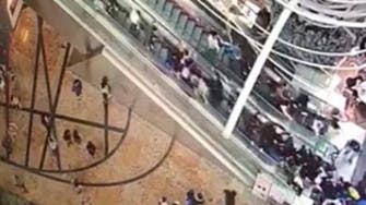 VIDEO: Crowded mall escalator suddenly malfunctions and reverses