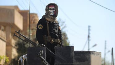 An Iraqi counter terrorism forces member stands guard in the Mosul al-Jadida area on March 26, 2017, following air strikes in which civilians have been reportedly killed during an ongoing offensive against the Islamic State (IS) group. Iraq is investigating air strikes in west Mosul that reportedly killed large numbers of civilians in recent days, a military spokesman said. (AFP)