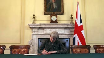 British PM Theresa May signs Brexit letter invoking Article 50