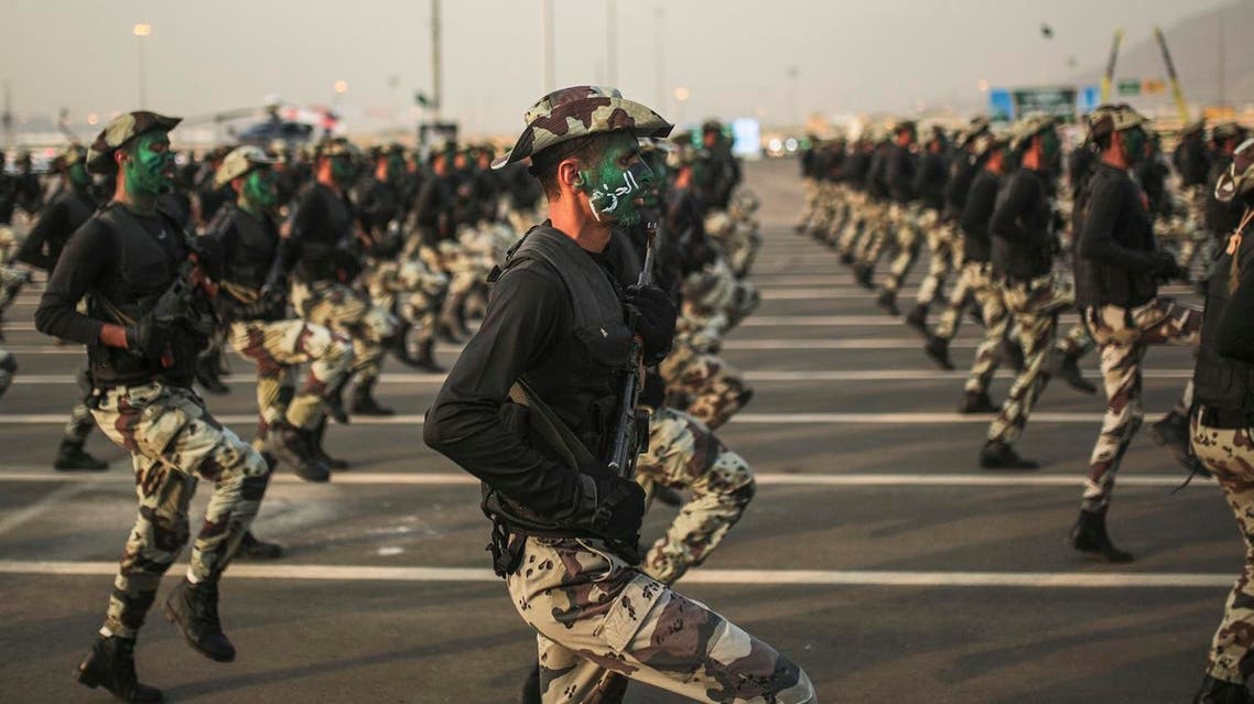 In this Thursday, Sept. 17, 2015 file photo, Saudi security forces, whose faces display the word 'Decisive' take part in a military parade. (File photo: AP)