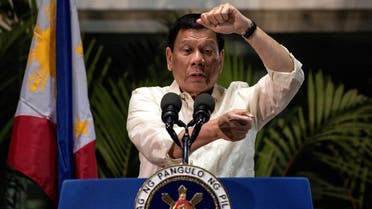 This picture taken on March 23, 2017 shows Philippine President Rodrigo Duterte speaking to the media at Manila International Airport upon his return from Thailand and Myanmar. Three turbulent decades after the Philippines shed dictatorship, President Rodrigo Duterte is offering a return to authoritarian rule as a solution to all the problems democracy has failed to fix. AFP