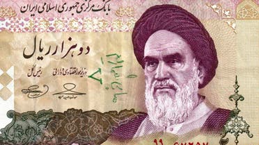 A 2,000 rial Iranian banknote showing Ayatollah Ruhollah Khomeini and a handwritten pro-opposition graffiti in Farsi. (File photo: AP)