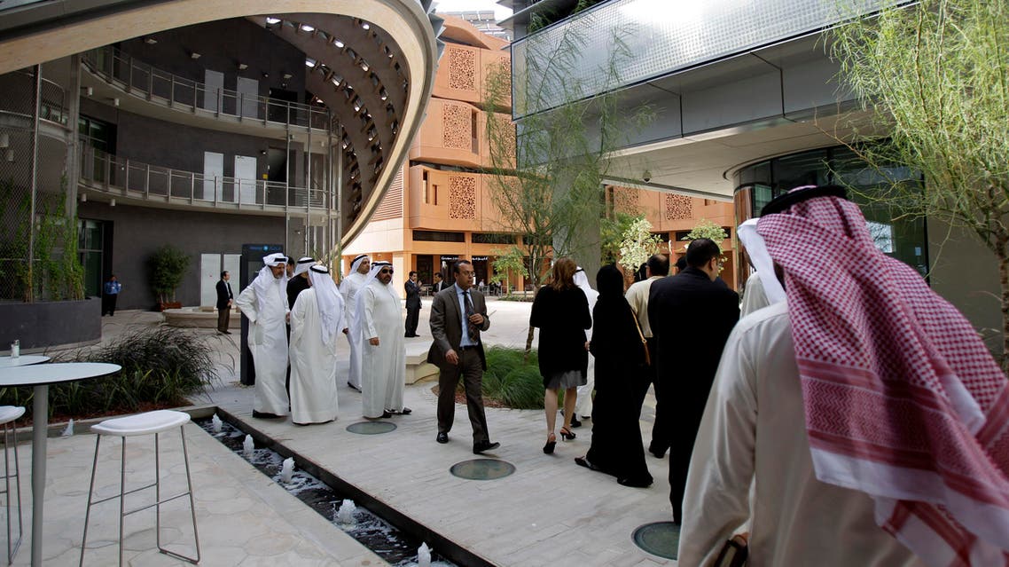 In this Jan. 16, 2011 file photo, people visit the Masdar Institute campus, part of Masdar City, a Mubadala company, in Abu Dhabi. (AP)