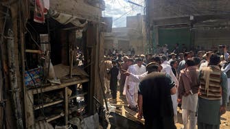 Bombing near place of worship kills 22 in NW Pakistan