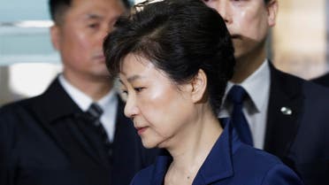 Ousted South Korean President Park Geun-hye arrives for questioning on her arrest warrant at the Seoul Central District Court in Seoul, South Korea, Thursday, March 30, 2017. 