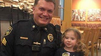 Girl, 4, sees cop eating alone, decides to keep him company